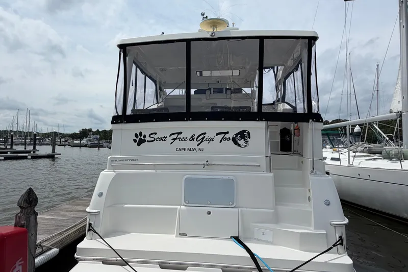 Slide: The Image of 2002 Silverton 392 Motor Yacht docked in Cape May, NJ marina. - 7