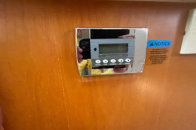 Slide: The Image of Thermostat control panel on 2002 Silverton 392 Motor Yacht interior wall. - 18