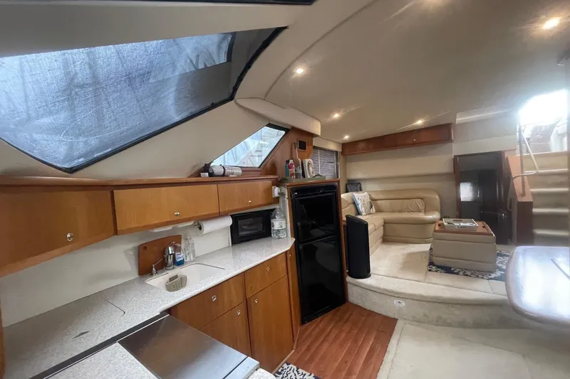 Slide: The Image of Luxurious interior of a 2002 Silverton 392 Motor Yacht with modern amenities. - 30