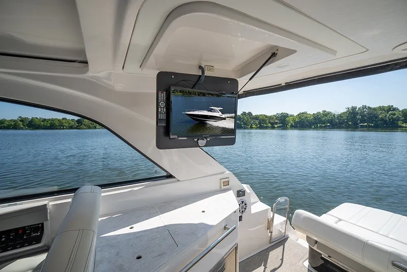 Slide: The Image of Cockpit TV above the wet bar - 18