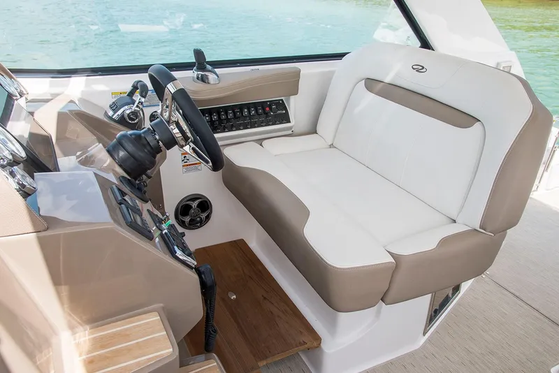 Slide: The Image of Manufacturer Provided Image: 2019 Regal 35 Sport Coupe helm seat and dashboard. - 3