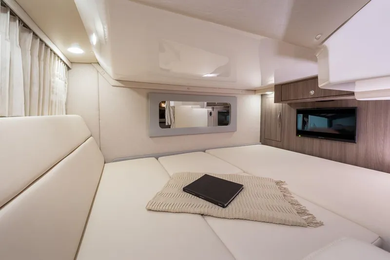 Slide: The Image of Manufacturer Provided Image: Luxurious interior cabin of 2019 Regal 35 Sport Coupe yacht with modern amenities. - 13