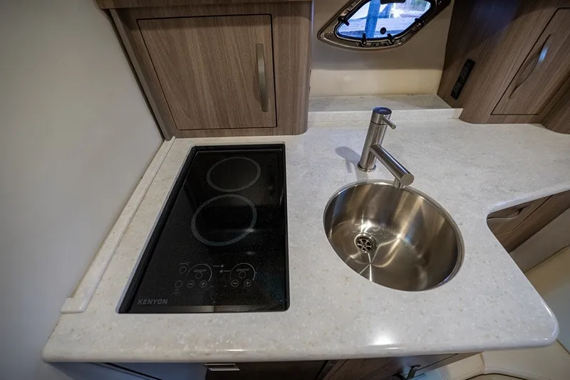 Slide: The Image of Kenyon 2-burner cooktop and galley sink - 59