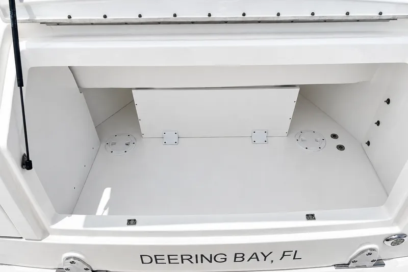 Slide: The Image of 2022 Sea Ray Sundancer 320 Coupe Outboard storage compartment, Deering Bay, FL. - 16