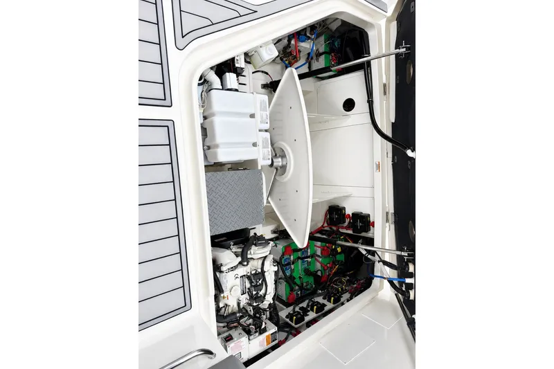 Slide: The Image of Engine compartment of 2022 Sea Ray Sundancer 320 Coupe Outboard, showcasing mechanical components. - 39