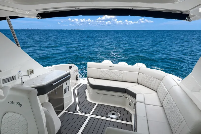 Slide: The Image of Luxurious 2022 Sea Ray Sundancer 320 Coupe Outboard with elegant seating and ocean view. - 18