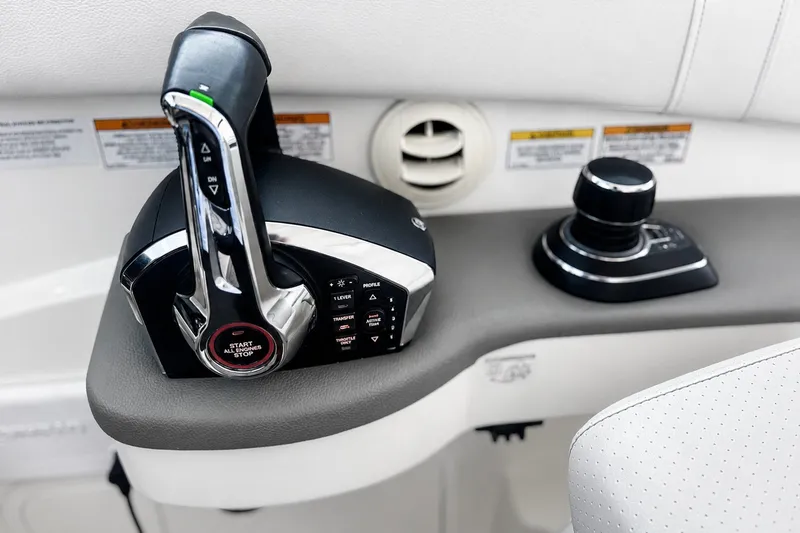 Slide: The Image of Control panel of 2022 Sea Ray Sundancer 320 Coupe Outboard with start-stop button. - 28