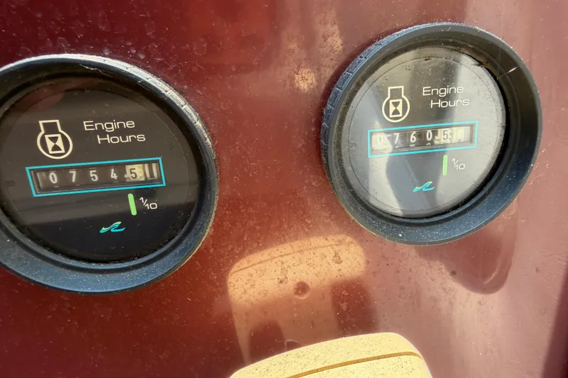 Slide: The Image of Close-up of engine hour meters on a 1989 Sea Ray Sundancer 280 boat. - 42