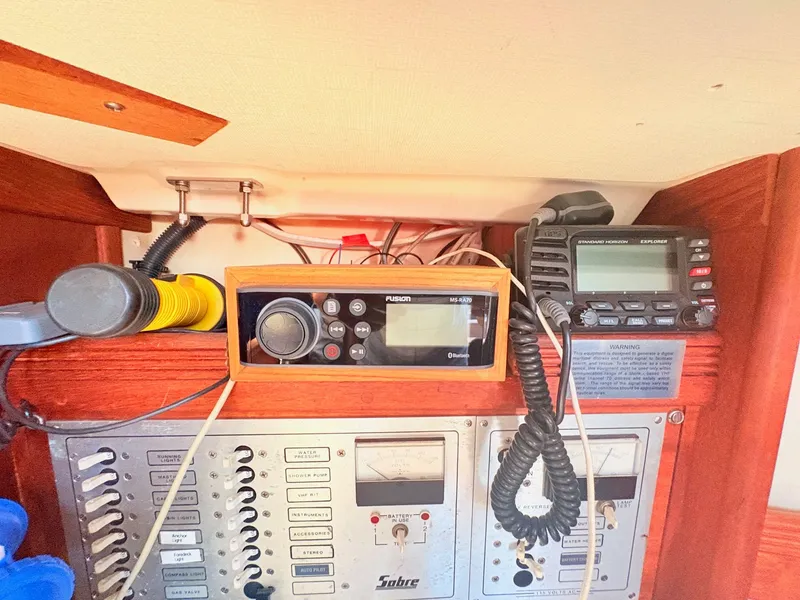Slide: The Image of The image shows the dashboard of a 1987 Sabre 30 MK III with various navigation equipment. - 27
