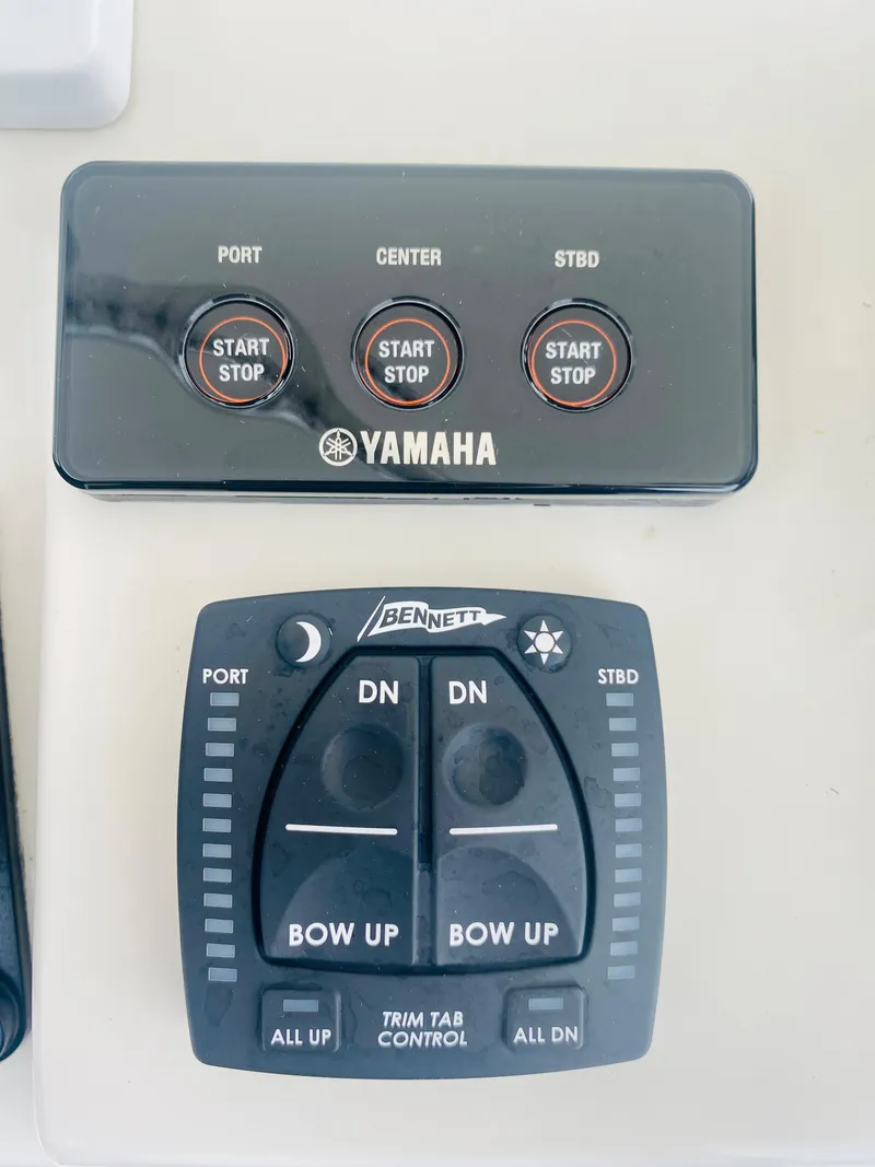 Slide: The Image of Yamaha engine controls and Bennett trim tab control on 2008 Intrepid 390 Sport Yacht. - 44