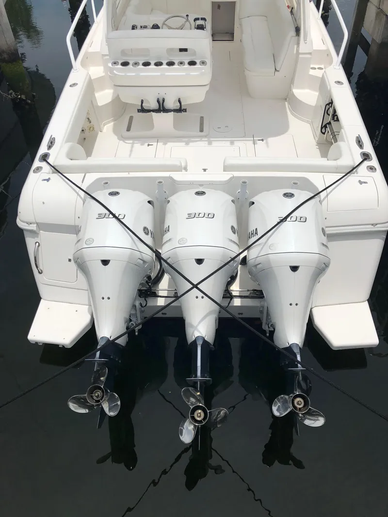 Slide: The Image of 2008 Intrepid 390 Sport Yacht with triple outboard engines. - 9