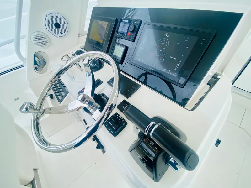 Slide: The Image of 2008 Intrepid 390 Sport Yacht helm with modern navigation and control systems. - 41