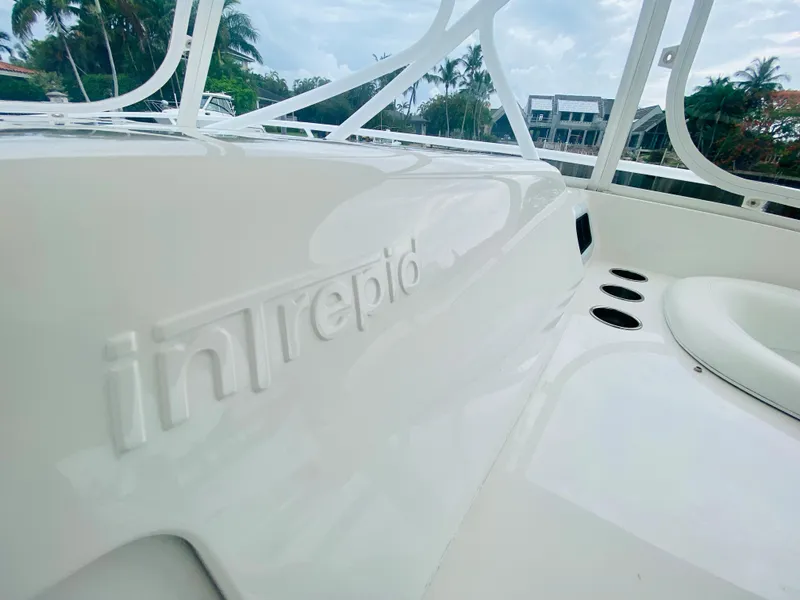 Slide: The Image of 2008 Intrepid 390 Sport Yacht deck with embossed logo. - 49