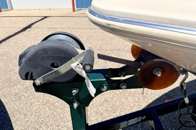 Slide: The Image of Trailer winch and bow stop on a 2002 Larson LXi 210 boat. - 65