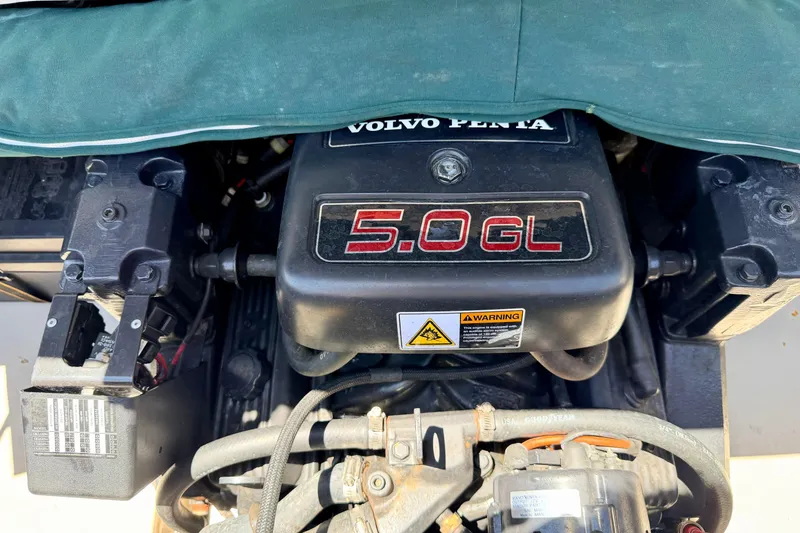 Slide: The Image of Volvo Penta 5.0GL engine in a 2002 Larson LXi 210 boat. - 24