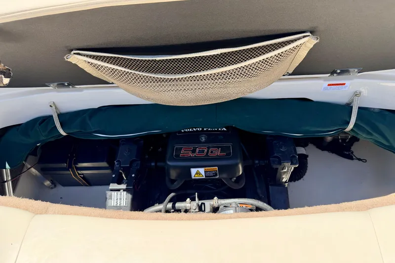 Slide: The Image of Engine compartment of a 2002 Larson LXi 210 boat with Volvo Penta 5.0 GL engine. - 27