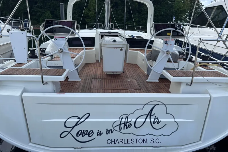 Slide: The Image of 2022 Beneteau Oceanis 46.1 sailboat with dual steering wheels, docked in Charleston, S.C. - 7