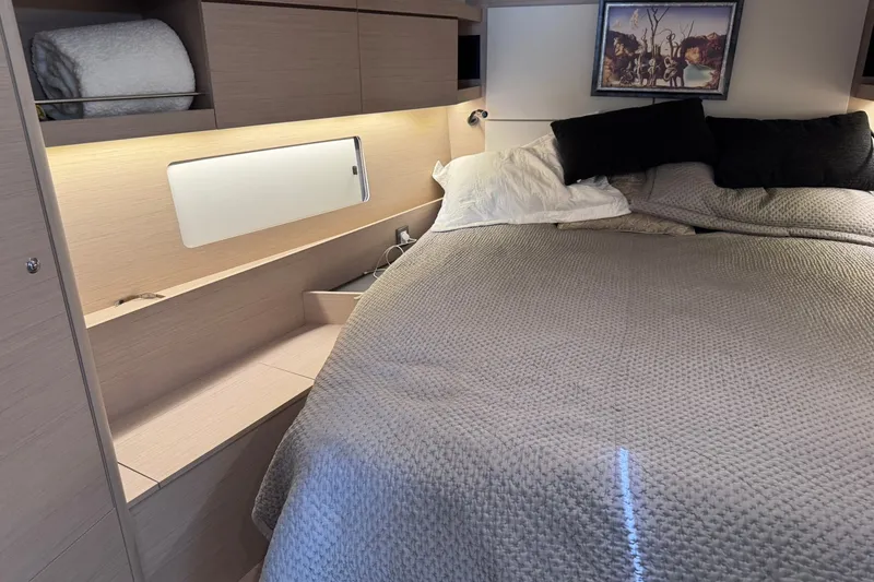 Slide: The Image of Luxurious cabin interior of 2022 Beneteau Oceanis 46.1 yacht with cozy bedding. - 29