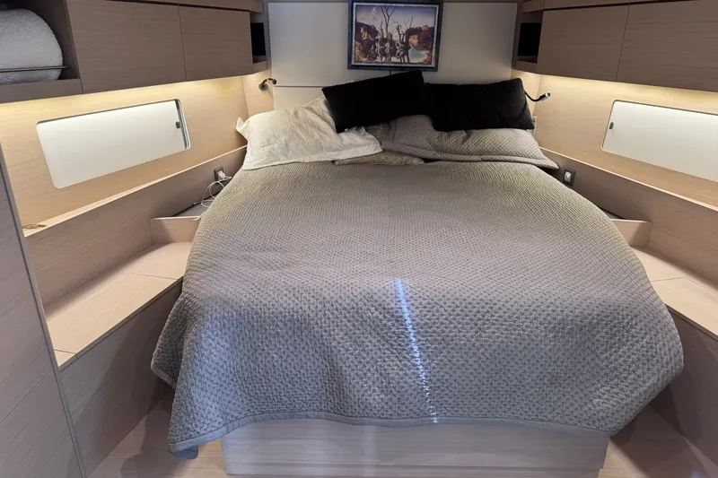 Slide: The Image of Luxurious cabin interior of 2022 Beneteau Oceanis 46.1 yacht with cozy bedding. - 26
