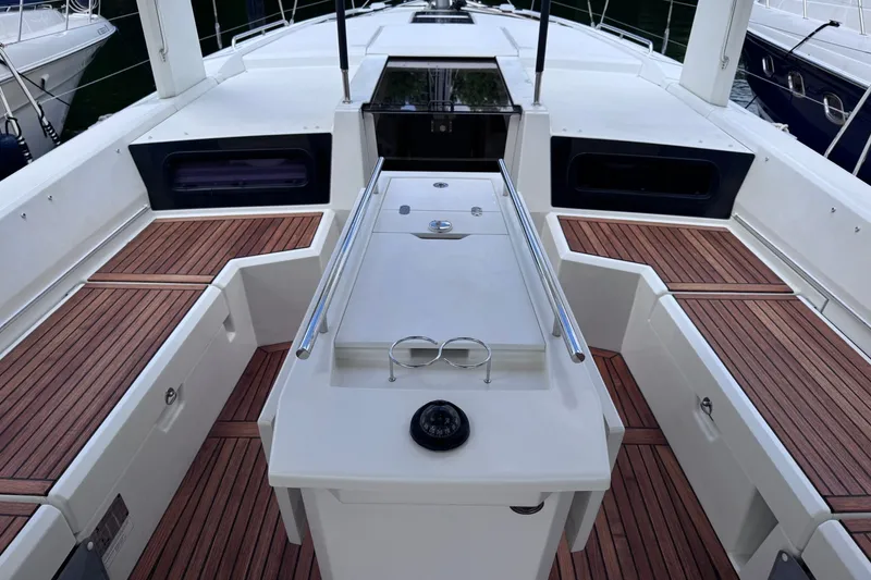 Slide: The Image of Cockpit of 2022 Beneteau Oceanis 46.1 yacht with teak flooring and sleek design. - 10