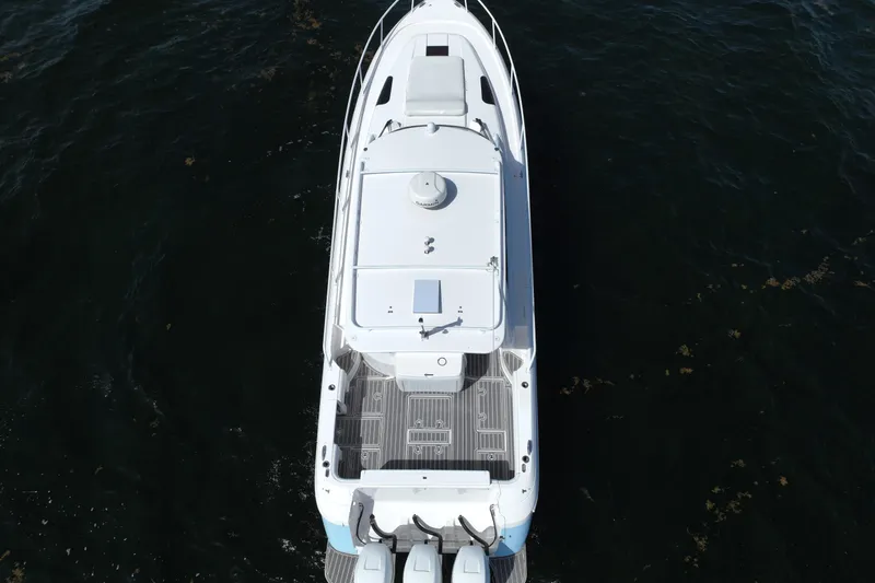 Slide: The Image of Top view of a 2017 Intrepid 430 Sport Yacht on dark water. - 18