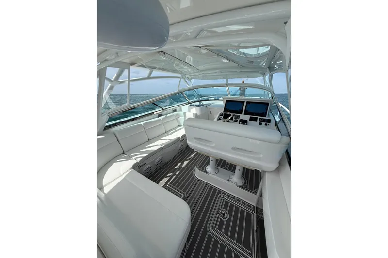 Slide: The Image of 2017 Intrepid 430 Sport Yacht interior with sleek design and advanced navigation systems. - 54