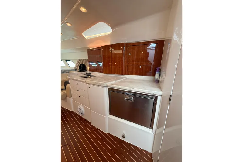 Slide: The Image of Luxurious interior of 2017 Intrepid 430 Sport Yacht with sleek cabinetry and modern appliances. - 28