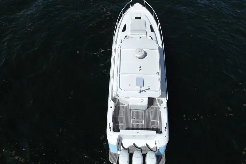 Slide: The Image of Aerial view of 2017 Intrepid 430 Sport Yacht on dark water. - 46