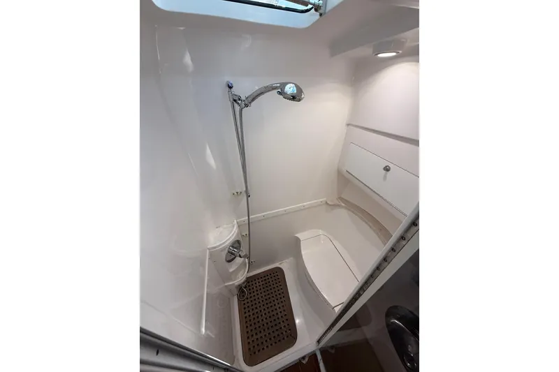 Slide: The Image of Shower area in 2017 Intrepid 430 Sport Yacht, featuring sleek design and modern fixtures. - 24