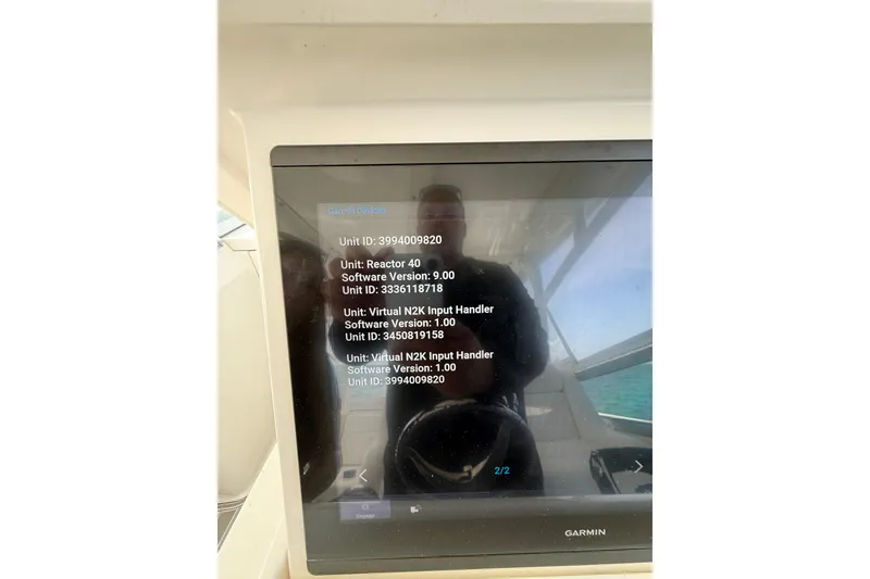 Slide: The Image of Garmin device display on 2017 Intrepid 430 Sport Yacht showing software versions and unit IDs. - 38