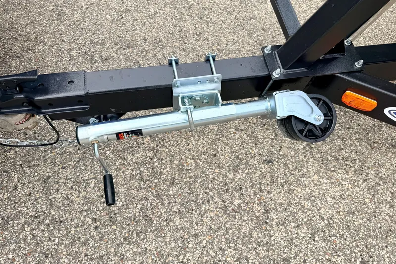 Slide: The Image of Trailer hitch and wheel assembly on a 2015 Manitou 25 SES BENCH. - 104