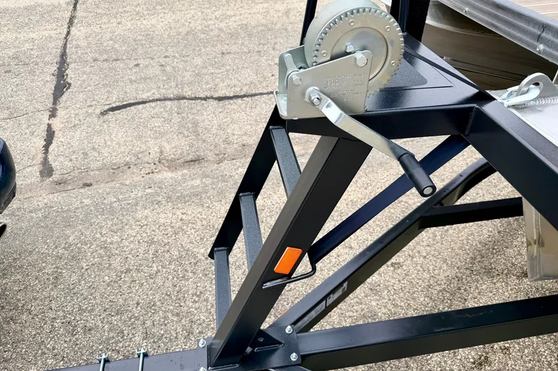Slide: The Image of Trailer winch mechanism on a 2015 Manitou 25 SES BENCH boat trailer. - 103