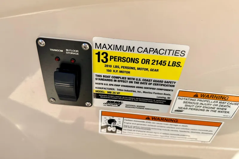 Slide: The Image of 2015 Manitou 25 SES BENCH capacity label, 13 persons or 2145 lbs, safety warnings. - 52