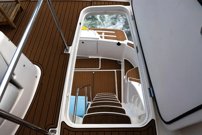 Slide: The Image of Staircase view on 2004 Meridian 411 Sedan yacht with teak flooring. - 14