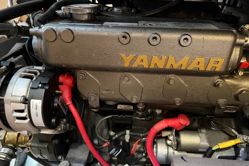 Slide: The Image of Yanmar engine in a 2017 Beneteau Oceanis 45 sailboat, showcasing detailed components. - 48