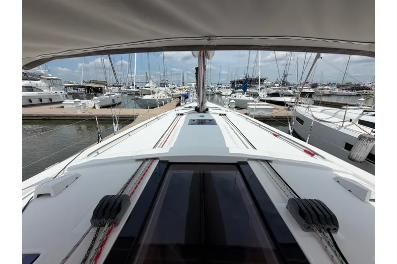Slide: The Image of Beneteau Oceanis 45 sailboat deck view at marina, 2017 model. - 16