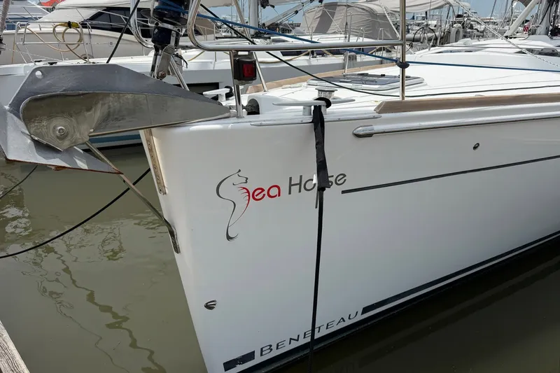 Slide: The Image of Beneteau Oceanis 45 sailboat, 2017 model, docked with "Sea Horse" branding. - 6