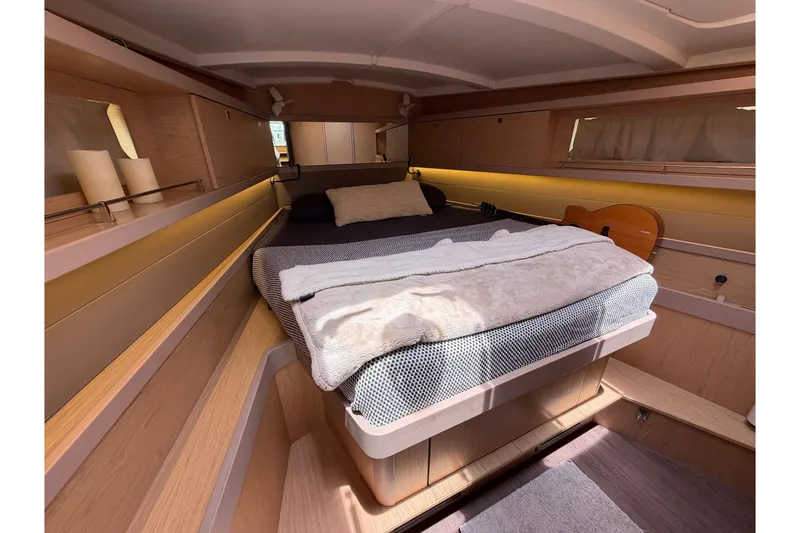 Slide: The Image of Luxurious cabin interior of 2017 Beneteau Oceanis 45 yacht with cozy bedding. - 35