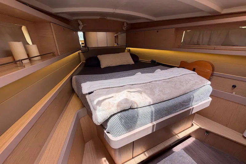 Slide: The Image of Luxurious cabin interior of 2017 Beneteau Oceanis 45 yacht with cozy bedding. - 38