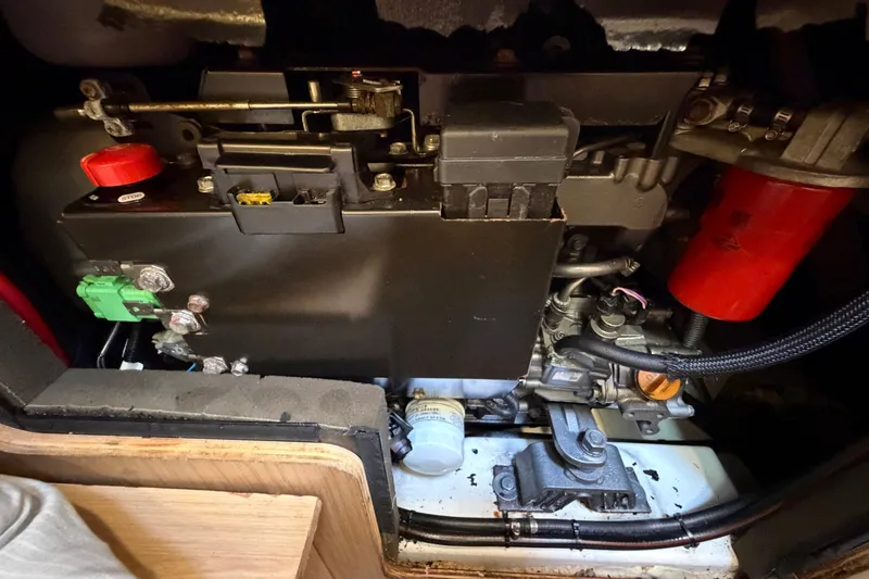Slide: The Image of Engine compartment of a 2017 Beneteau Oceanis 45 sailboat, showcasing mechanical components. - 51