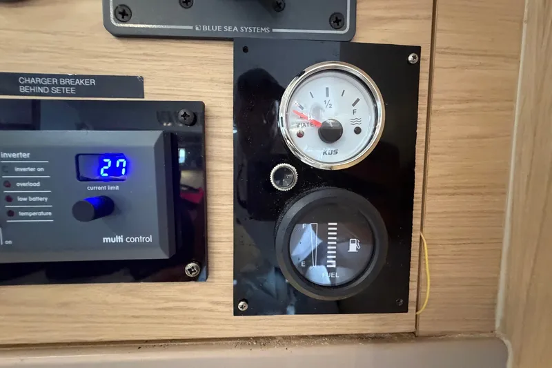 Slide: The Image of Control panel of a 2017 Beneteau Oceanis 45 yacht with gauges and switches. - 62