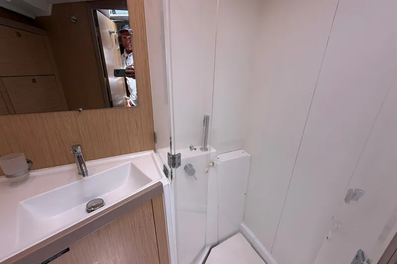 Slide: The Image of Bathroom interior of 2017 Beneteau Oceanis 45 yacht with sink and shower. - 42
