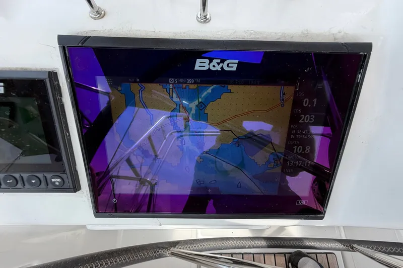 Slide: The Image of B&G navigation display on 2017 Beneteau Oceanis 45 sailboat, showing nautical chart. - 56