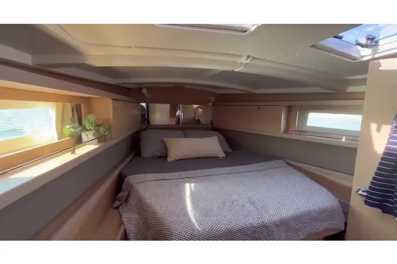 Slide: The Image of Luxurious cabin interior of 2017 Beneteau Oceanis 45 yacht with cozy bedding. - 34