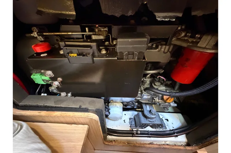 Slide: The Image of Engine compartment of a 2017 Beneteau Oceanis 45 sailboat, showcasing mechanical components. - 48