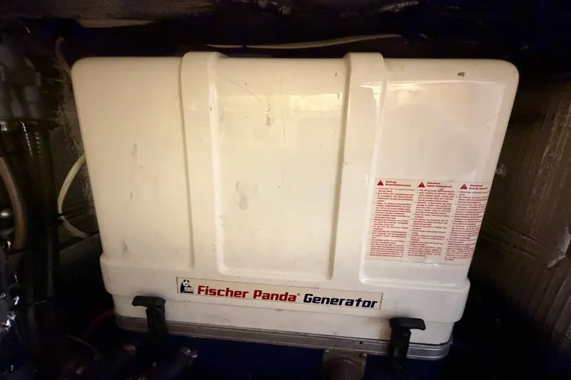 Slide: The Image of Fischer Panda generator inside a 2017 Beneteau Oceanis 45 yacht engine room. - 53