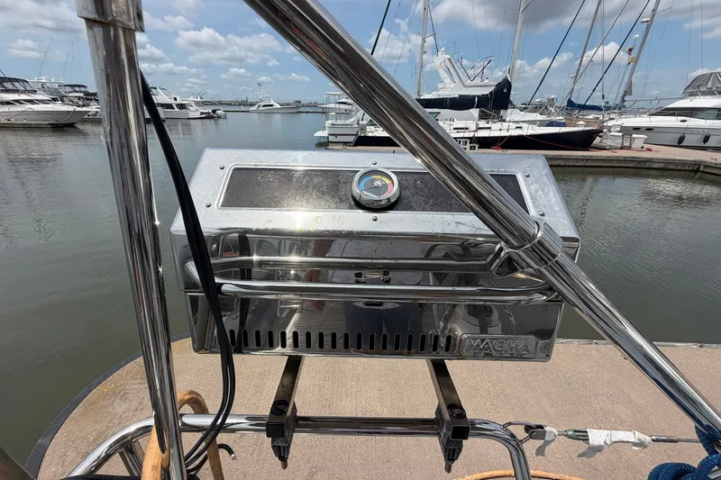 Slide: The Image of Outdoor grill on a 2017 Beneteau Oceanis 45 yacht, docked at a marina. - 65
