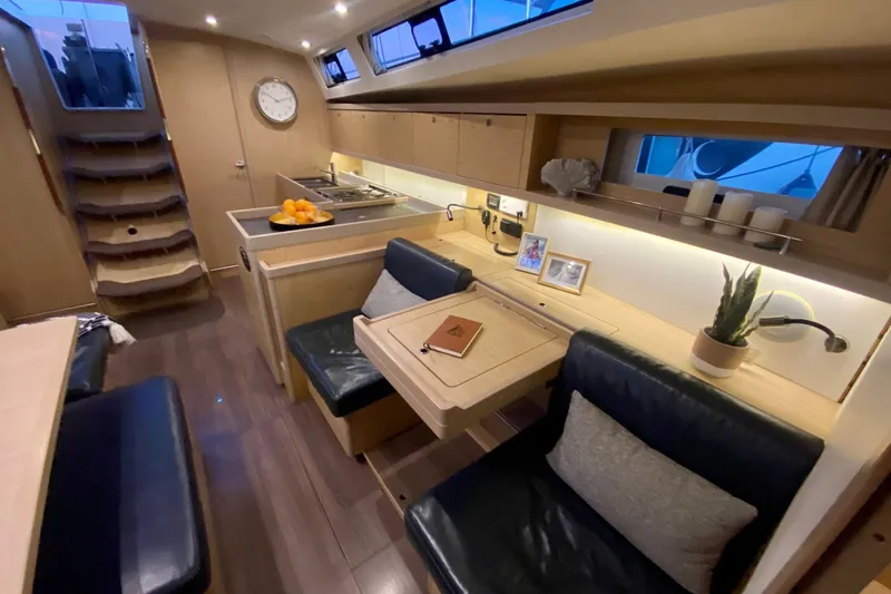 Slide: The Image of Luxurious interior of 2017 Beneteau Oceanis 45 yacht with modern furnishings and elegant design. - 36