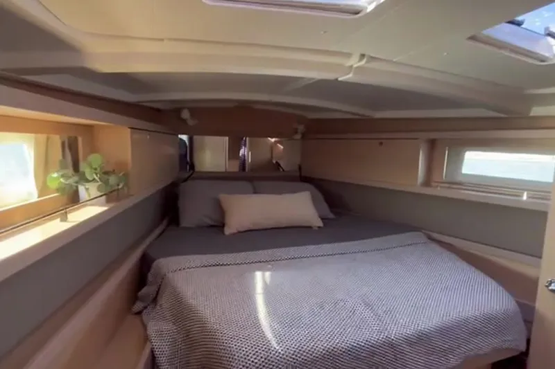Slide: The Image of Luxurious cabin interior of 2017 Beneteau Oceanis 45 yacht with cozy bedding. - 37