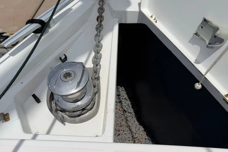 Slide: The Image of Anchor chain and windlass on a 2017 Beneteau Oceanis 45 sailboat deck. - 15